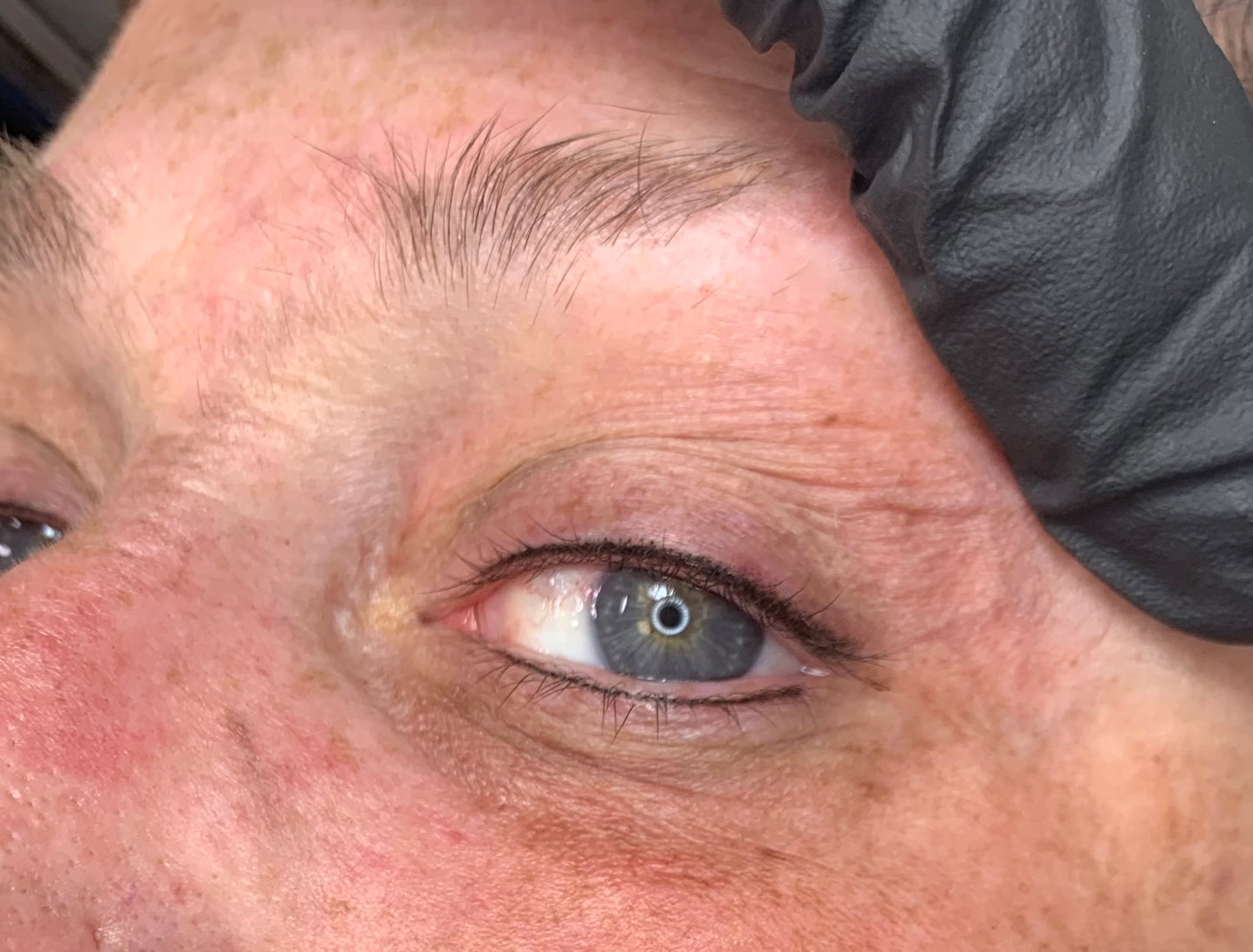Eyelash enhancement tattoo